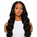 Woman wearing 20" body wave feather crochet human hair extensions
